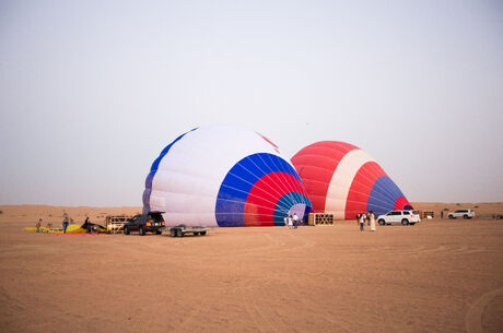 Sunrise Hot Air Ballooning with Breakfast, Photo with Falcon & Camel Ride + Desert Safari Upgrade